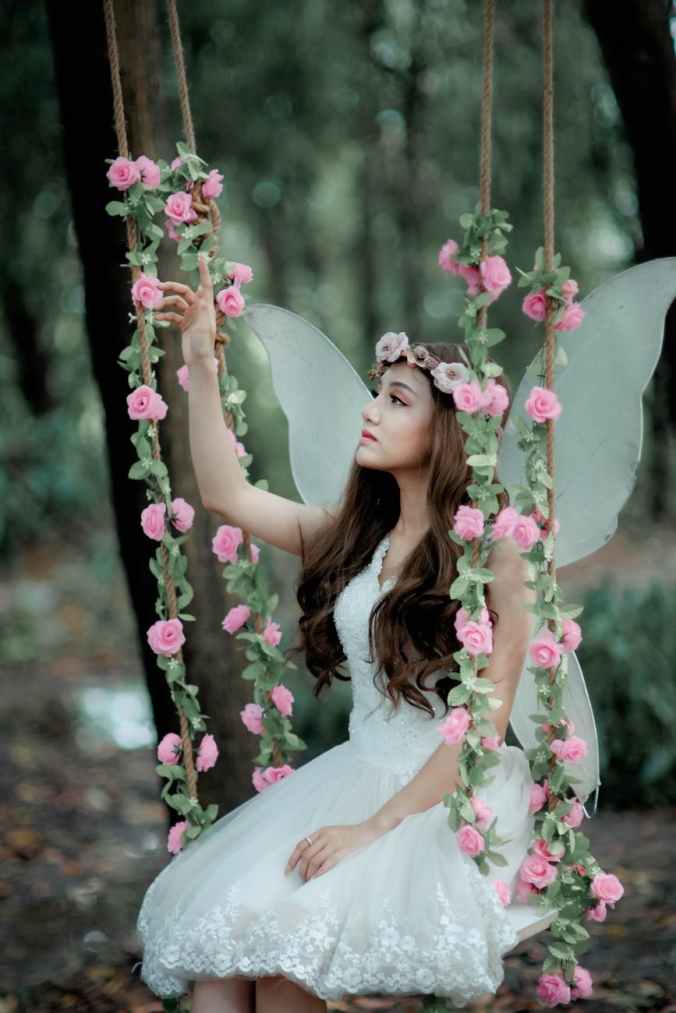 woman posing like fairy